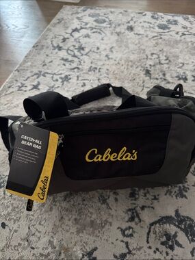 Cabela's Black and Olive Men's Catch-All Belt Bag with Yellow Logo